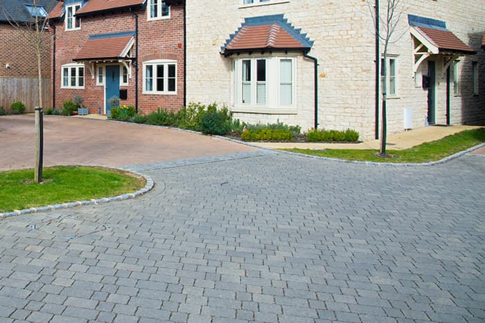 The commonly used materials for driveways and paths are flagstones, block paving, or gravel.